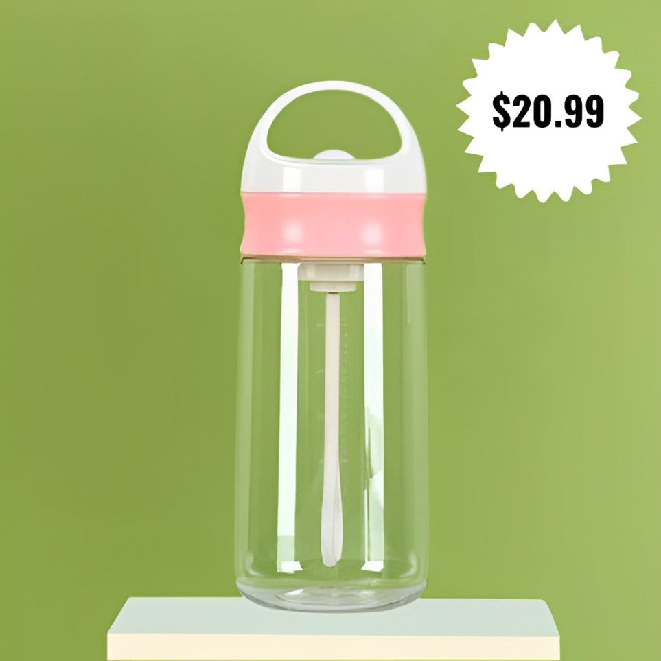 Pink and white water bottle with handle, perfect for on-the-go hydration. Automatic Stirring Cup.